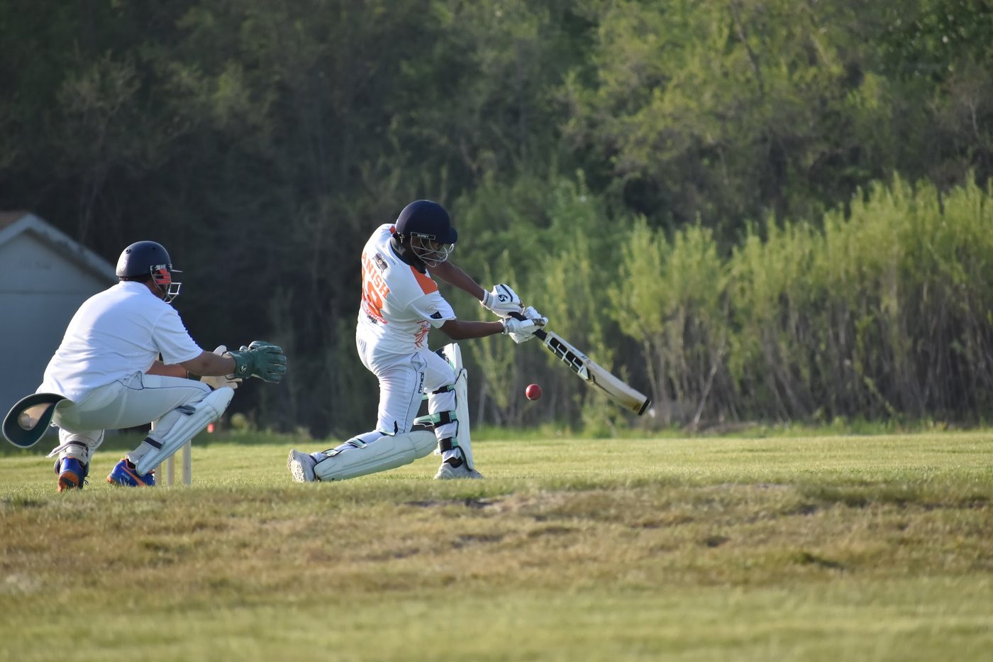 Anish cuts, the ball just off the bat as the keeper lunges